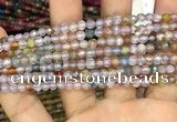 CAA2844 15 inches 4mm faceted round fire crackle agate beads wholesale