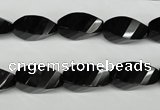 CAG4009 15.5 inches 8*16mm faceted & twisted rice black agate beads