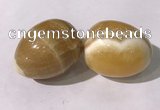 CDN1380 35*45mm egg-shaped yellow calcite decorations wholesale