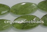 CGA104 15.5 inches 15*30mm faceted oval natural green garnet beads