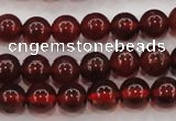 CGA601 15.5 inches 6mm A grade round natural orange garnet beads