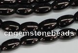 CJB53 15.5 inches 10*16mm rice natural jet gemstone beads