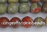 CSL233 15.5 inches 10mm faceted round silver leaf jasper beads