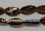 CTE1098 15.5 inches 10*20mm twisted & faceted oval yellow tiger eye beads