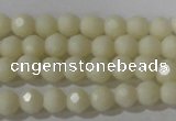 CTU1440 15.5 inches 4mm faceted round synthetic turquoise beads