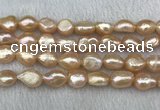 FWP290 15 inches 10mm - 11mm baroque pink freshwater pearl strands