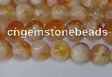 CAA1071 15.5 inches 6mm round sakura agate gemstone beads