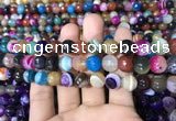 CAA1682 15.5 inches 10mm faceted round banded agate beads