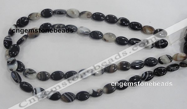 CAA210 15.5 inches 10*14mm oval madagascar agate beads