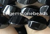 CAA2490 15.5 inches 6*12mm faceted & twisted rice black agate beads