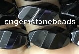 CAA2491 15.5 inches 8*16mm faceted & twisted rice black agate beads