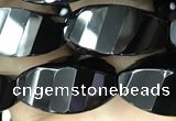 CAA2492 15.5 inches 10*20mm faceted & twisted rice black agate beads