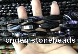 CAA2656 15.5 inches 10*30mm faceted rice banded black agate beads