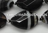 CAA286 22*30mm twisted & faceted oval black line agate beads