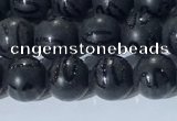 CAA3660 15.5 inches 6mm round matte & carved black agate beads