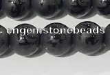 CAA3675 15.5 inches 6mm round matte & carved black agate beads