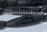 CAA3681 15.5 inches 8*30mm rice matte & carved black agate beads