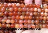 CAA6152 15 inches 8mm round orange Botswana agate beads
