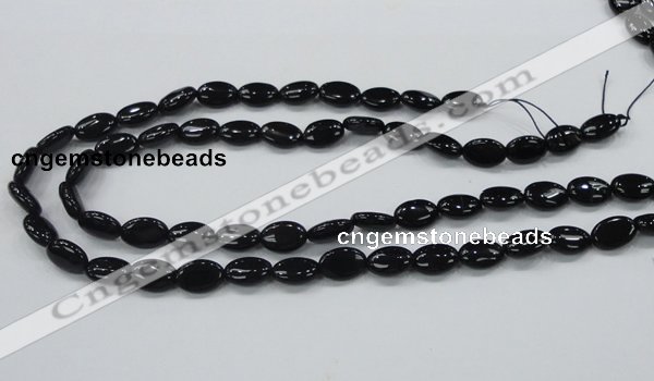 CAB318 15.5 inches 8*12mm oval black agate gemstone beads wholesale