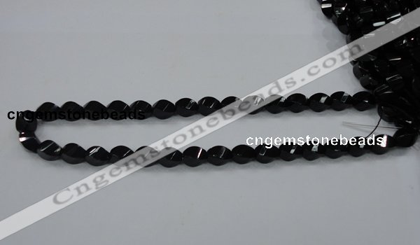 CAB335 15.5 inches 8*12mm faceted & twisted rice black agate beads