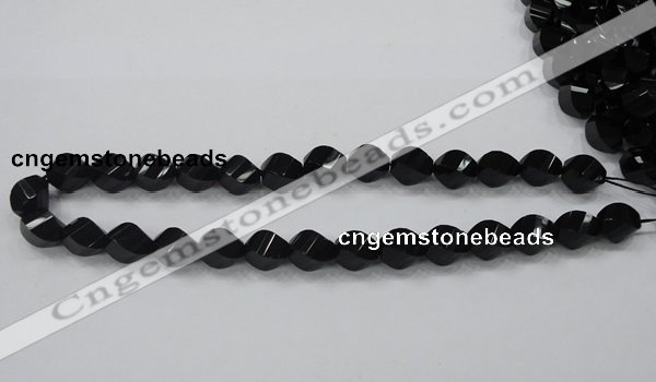 CAB336 15.5 inches 10*14mm faceted & twisted rice black agate beads