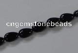 CAB744 15.5 inches 6*8mm flat teardrop black agate gemstone beads