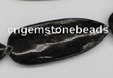 CAE72 15.5 inches 18*44mm flat teardrop astrophyllite beads wholesale