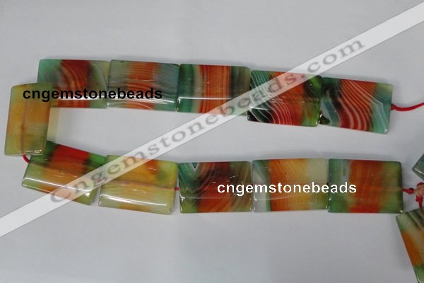 CAG1057 15.5 inches 25*35mm flat tube rainbow agate beads