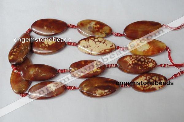 CAG1591 15.5 inches 22*38mm twisted oval fire crackle agate beads