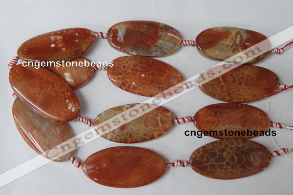 CAG1592 15.5 inches 25*50mm twisted oval fire crackle agate beads