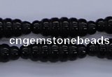 CAG1695 15.5 inches 10*30mm carved rice black agate beads