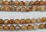 CAG1885 15.5 inches 6mm faceted round lemon crazy lace agate beads