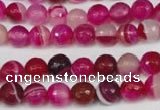 CAG2085 15.5 inches 6mm faceted round fuchsia line agate beads