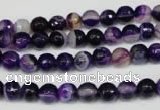 CAG2094 15.5 inches 6mm faceted round purple line agate beads
