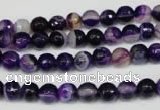 CAG2094 15.5 inches 6mm faceted round purple line agate beads