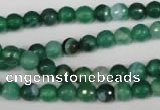 CAG2112 15.5 inches 6mm faceted round green line agate beads