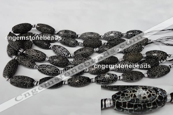 CAG2295 15.5 inches 13*25mm faceted rice fire crackle agate beads