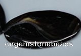 CAG3015 15.5 inches 25*50mm twisted oval black line agate beads