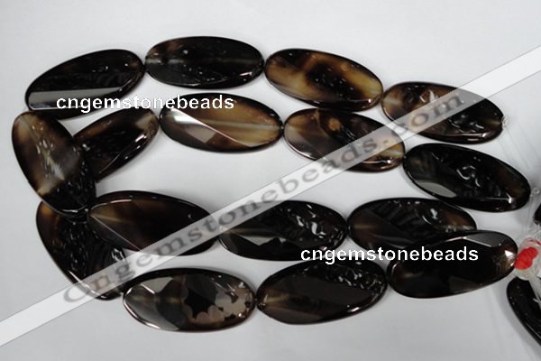 CAG3091 15.5 inches 25*50mm faceted oval black line agate beads