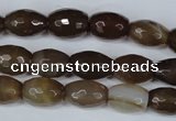 CAG3129 15.5 inches 10*14mm faceted rice brown line agate beads