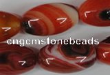 CAG3274 15.5 inches 16*30mm rice red line agate beads