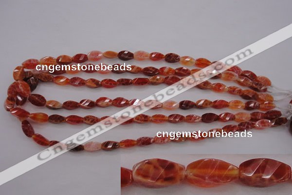 CAG4180 15.5 inches 6*12mm faceted & twisted rice natural fire agate beads