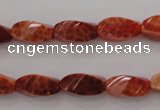 CAG4181 15.5 inches 7*14mm faceted & twisted rice natural fire agate beads