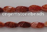 CAG4181 15.5 inches 7*14mm faceted & twisted rice natural fire agate beads