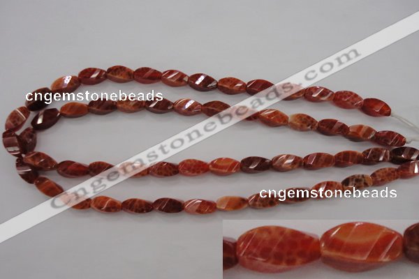 CAG4181 15.5 inches 7*14mm faceted & twisted rice natural fire agate beads