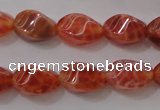 CAG4184 15.5 inches 6*10mm twisted rice natural fire agate beads