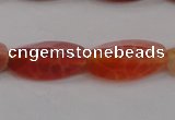 CAG4201 7*14mm faceted & twisted trihedron natural fire agate beads