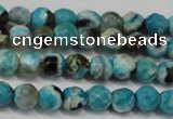 CAG5659 15 inches 4mm faceted round fire crackle agate beads