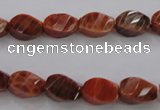 CAG581 15.5 inches 8*12mm faceted & twisted rice natural fire agate beads