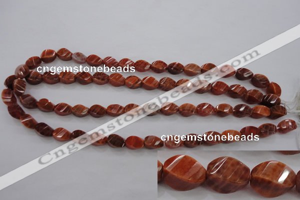 CAG581 15.5 inches 8*12mm faceted & twisted rice natural fire agate beads